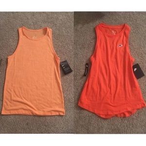 Pair of 2 orange Nike tank tops dri-fit shirt set